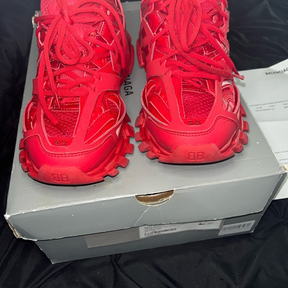 These are in a 39 men’s (6 US in men’s) Balenciaga track runners RED